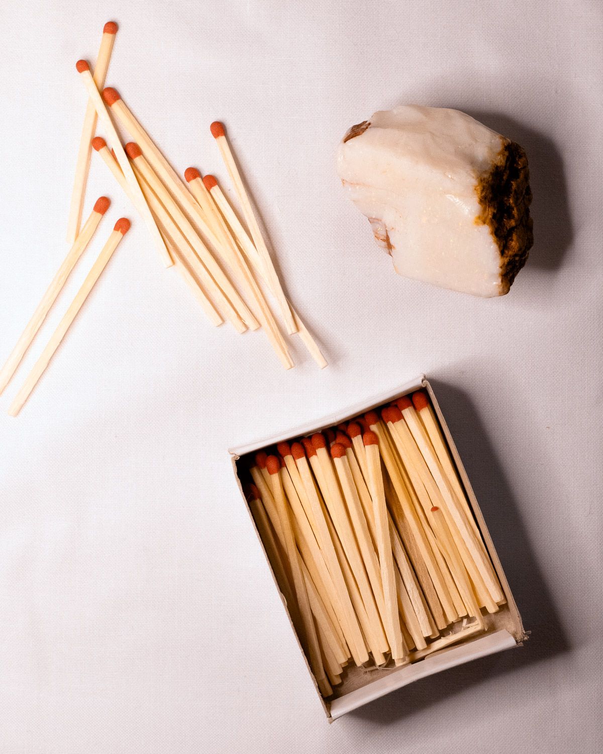 Opal No. 002 beside a box of red-tipped matches