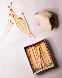 Opal No. 002 beside a box of red-tipped matches