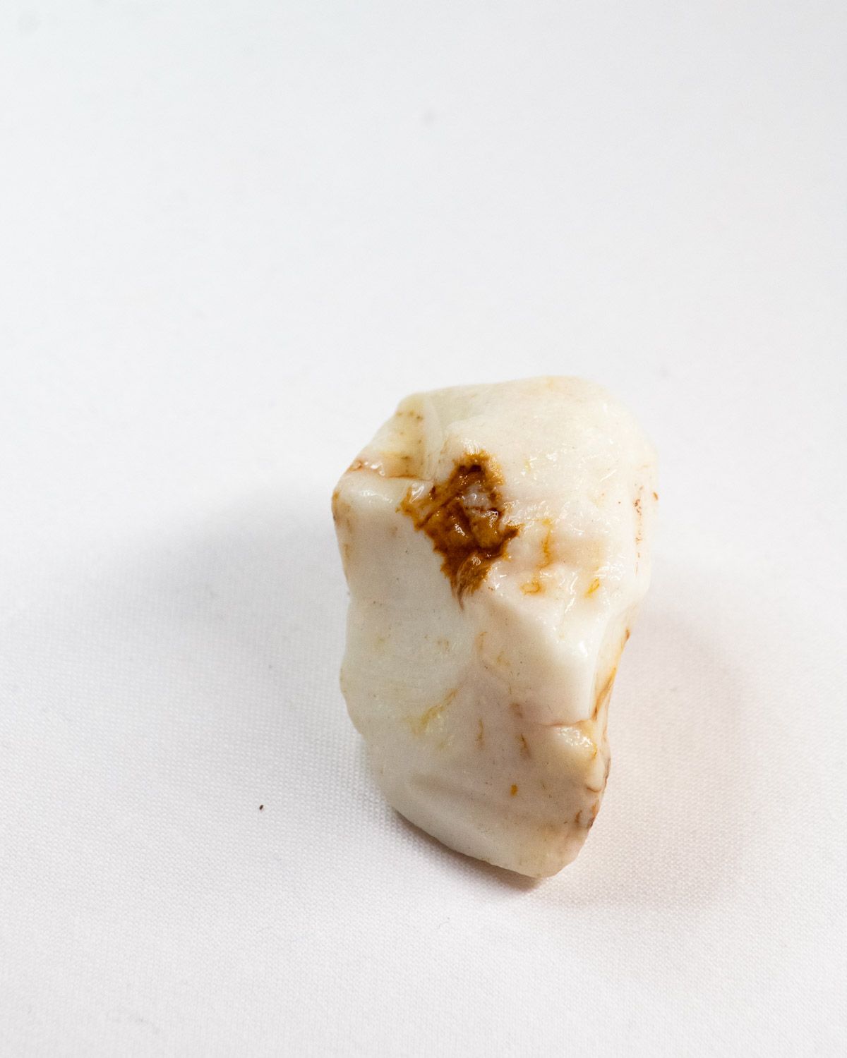 Opal No. 010, side with a small patch of ochre ironstone