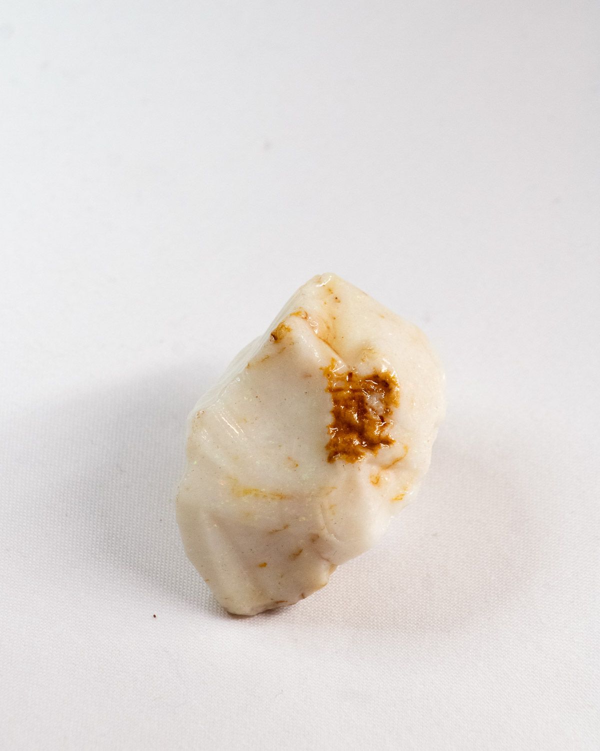 Opal No. 010, top with a spot of ochre ironstone
