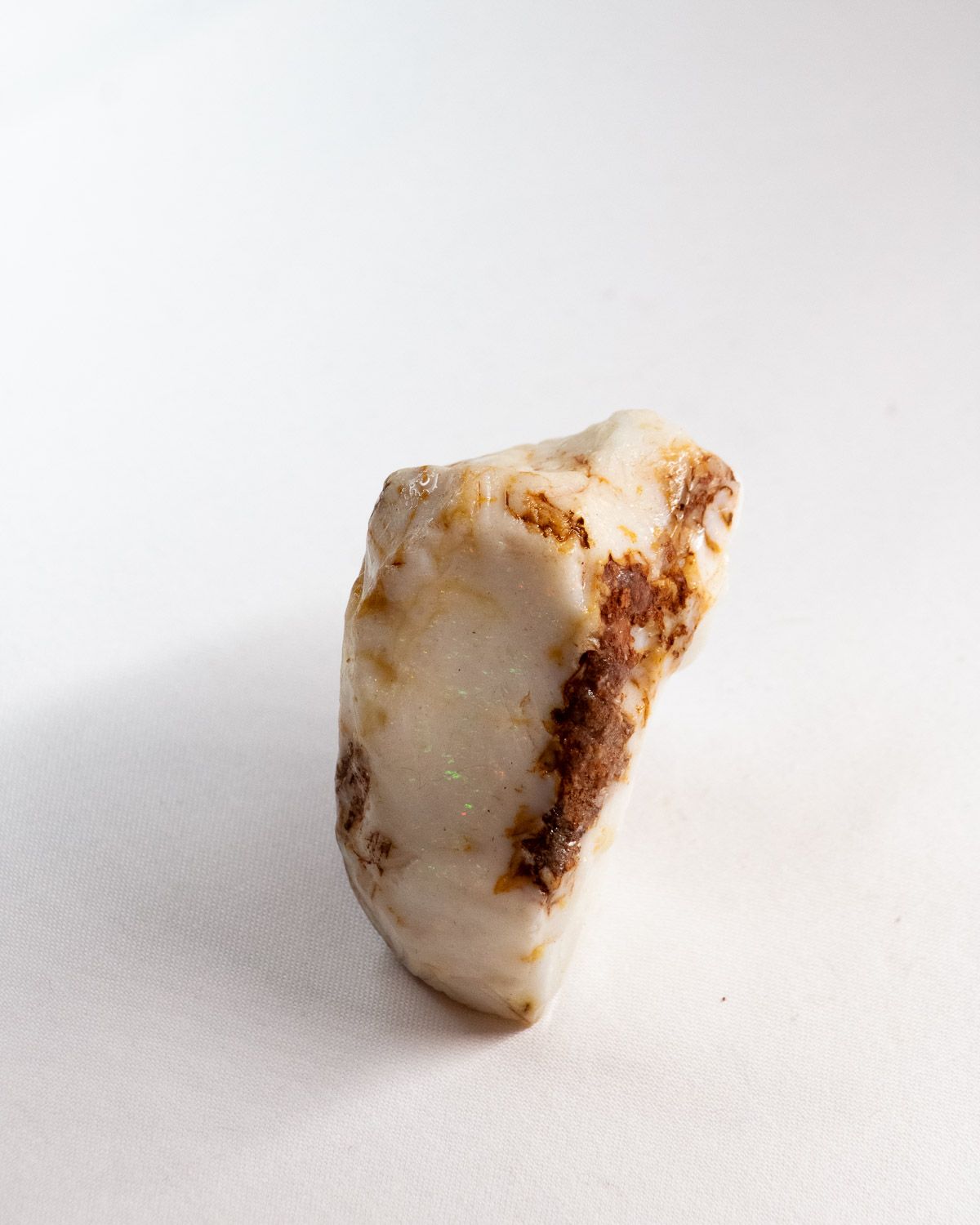Opal No. 011, face showing pin fire with ironstone edges
