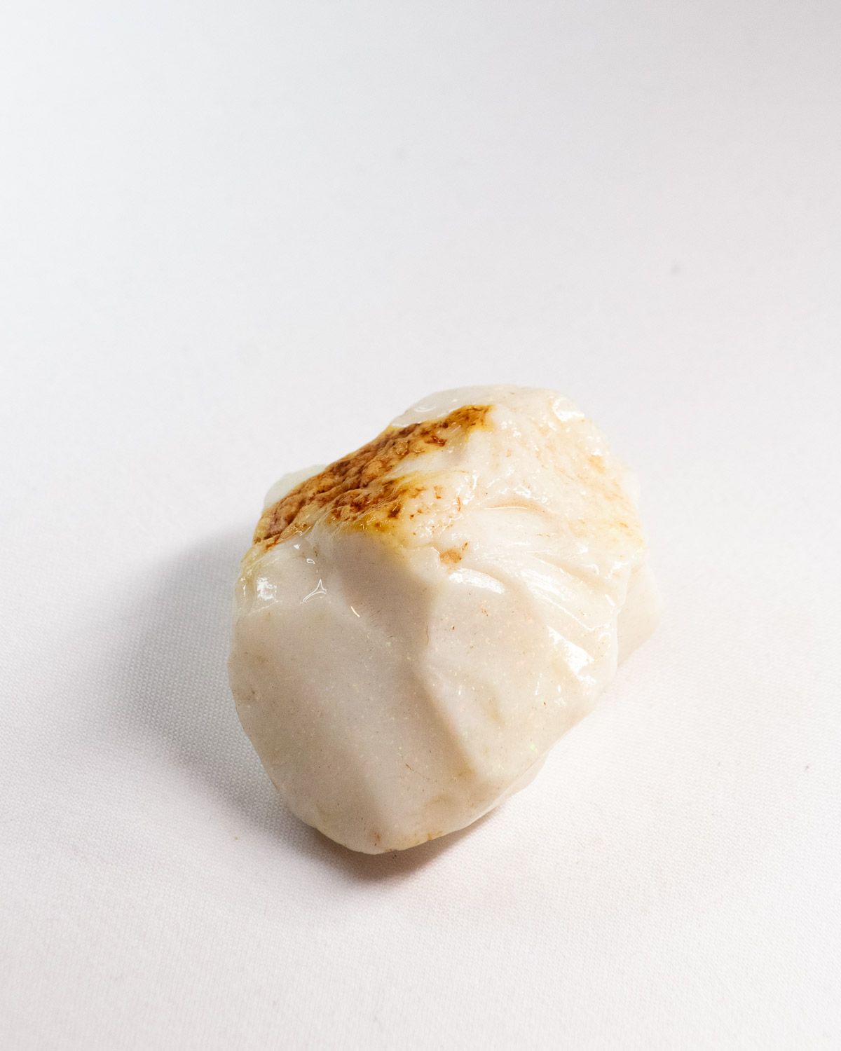 Opal No. 012, side with an ochre ironstone crown