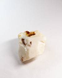 Opal No. 012, white face with small patches of brown ironstone