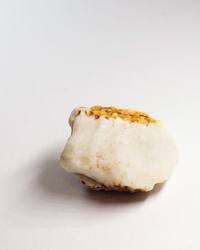 Opal No. 013, white face showing pin fire under an ochre ironstone crown