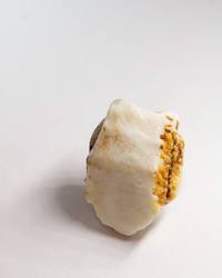 Opal No. 013, side showing pin fire with an ochre ironstone edge
