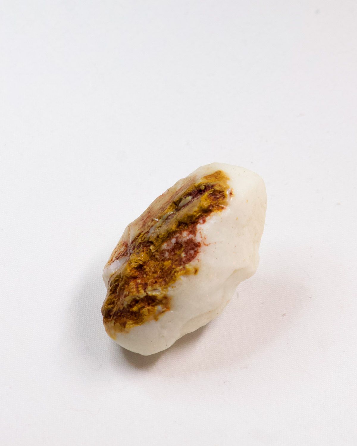 Opal No. 014, side with a band of ochre ironstone