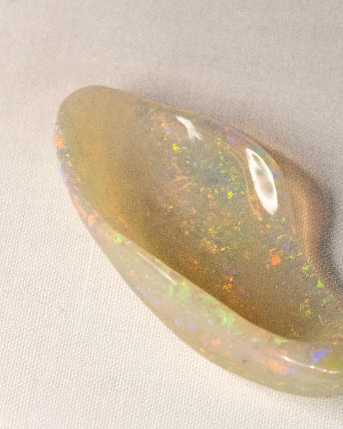 Opal No. 016, close up of the fire in the hollow of the stone