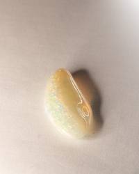 Opal No. 016, end view showing colour along one edge