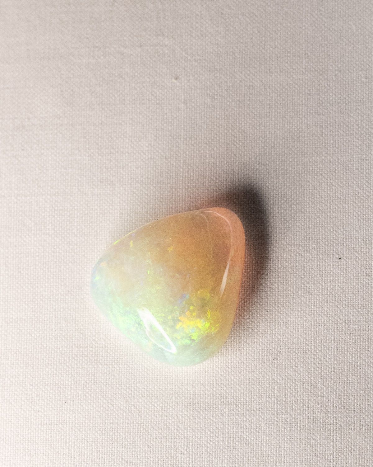 Opal No. 017, face showing a soft honey tone with green fire