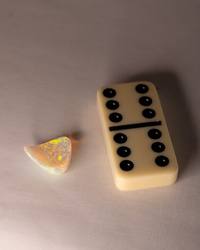 Opal No. 017 beside a domino