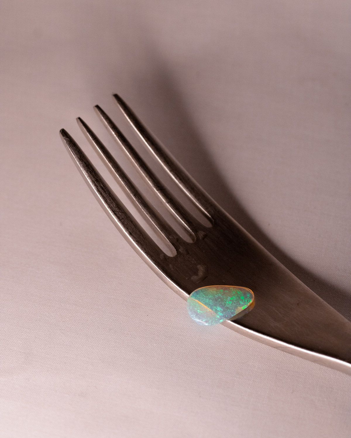 Opal No. 018 resting on a silver fork