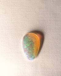 Opal No. 018, teardrop with green and blue fire beside a band of amber