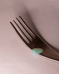 Opal No. 018 resting on a silver fork
