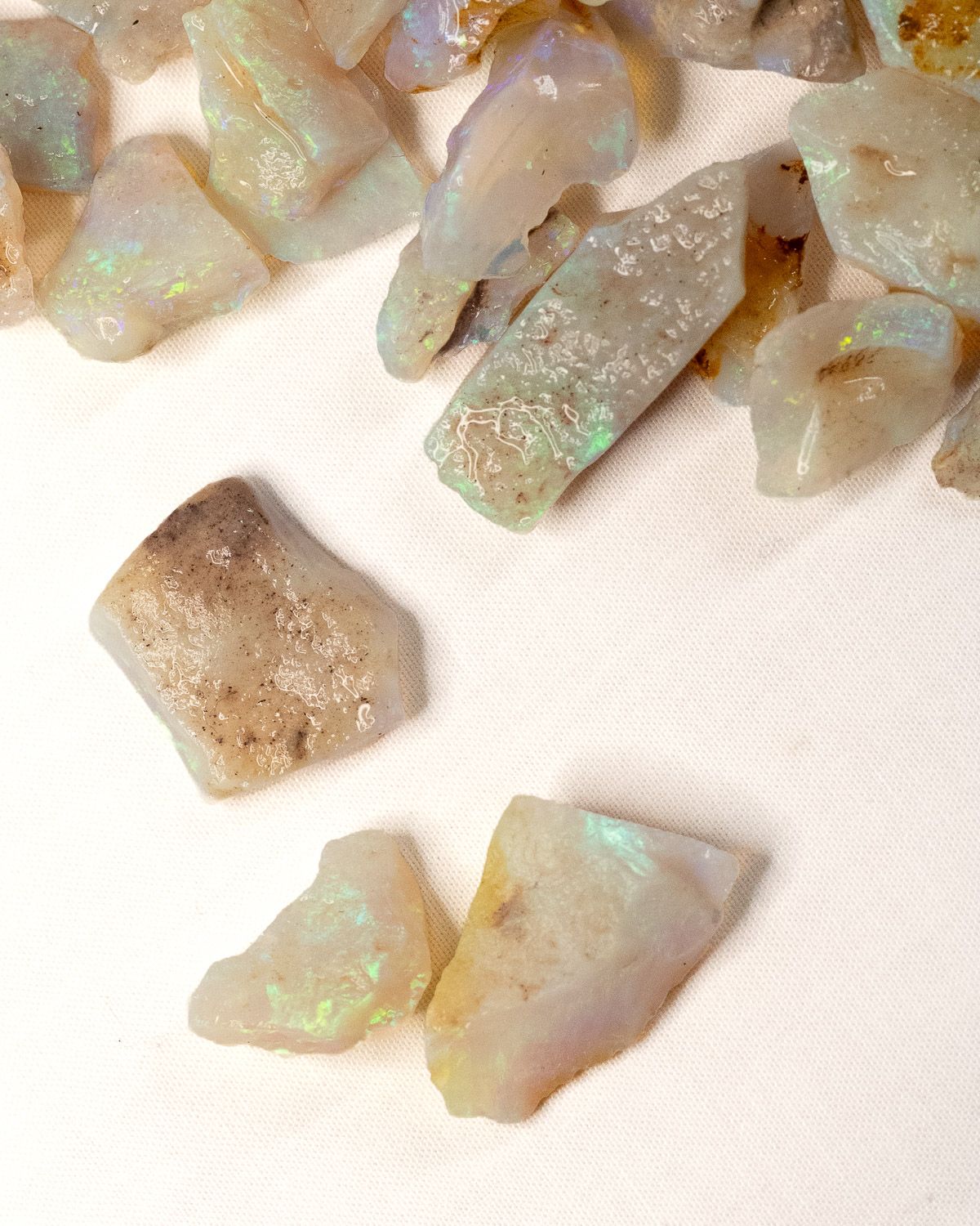 Opal No. 020, close up of a few pieces with green fire